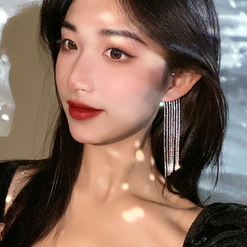 The Cascade Crystal Tassel Earrings – image 3